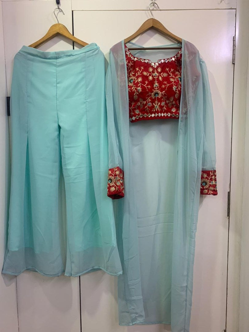 Sea green tapeta silk indowestern plazzo suit with shrug