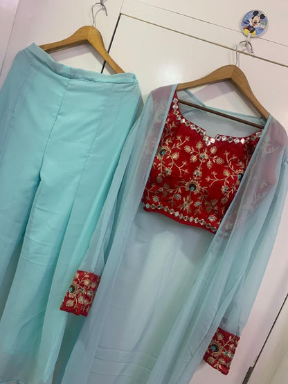 Sea green tapeta silk indowestern plazzo suit with shrug