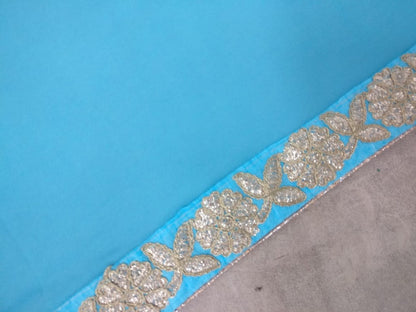 Sky blue and pink colored georgette embroidered partywear saree