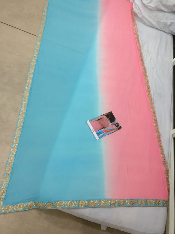 Sky blue and pink colored georgette embroidered partywear saree