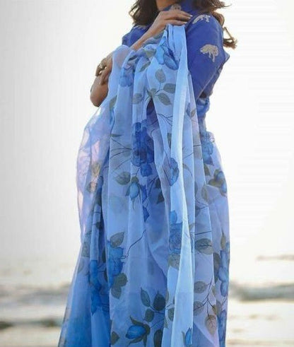 Sky blue flower printed organza saree