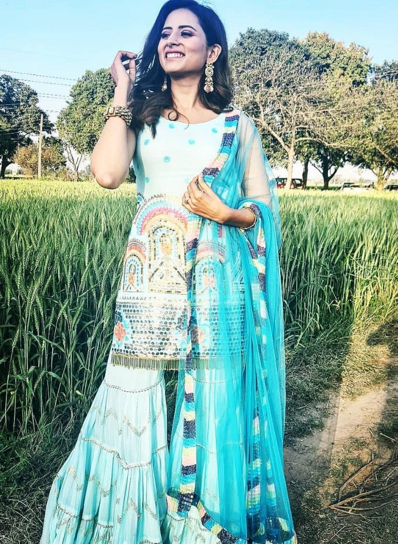 Sky blue georgette embroidered sharara salwar suit