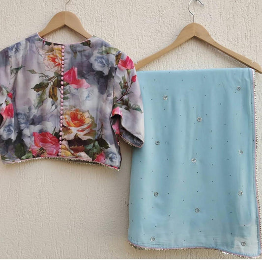 Sky blue georgette stone work saree with floral printed blouse