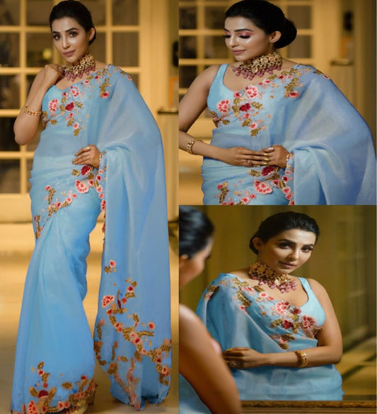 Sky blue heavy kasturi silk georgette thread work saree