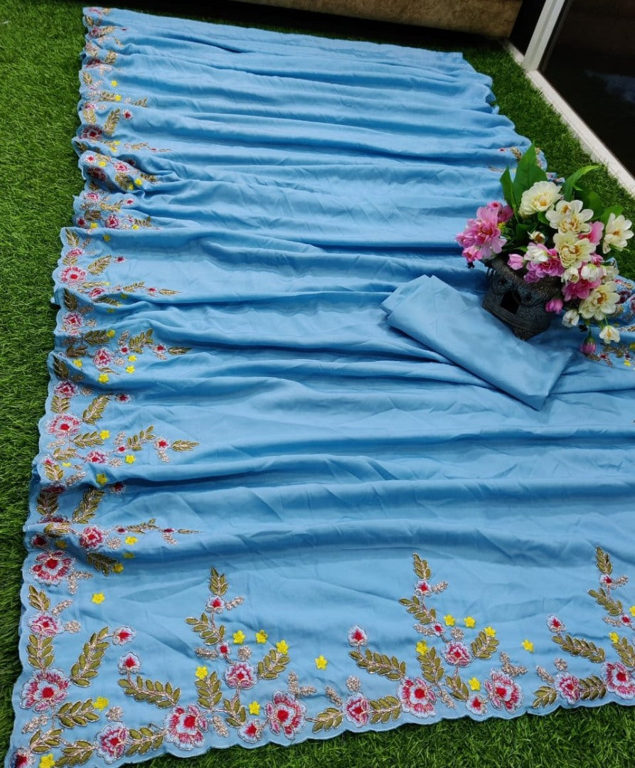 Sky blue heavy kasturi silk georgette thread work saree