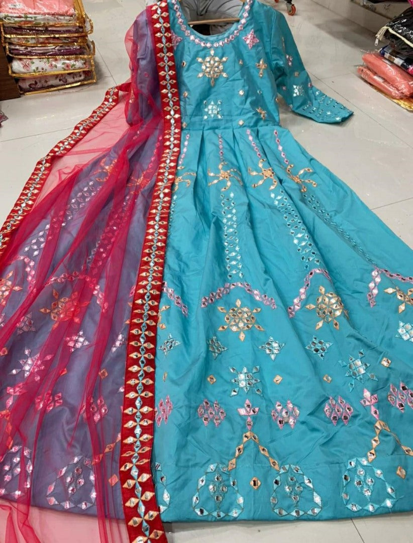Sky blue heavy taffeta silk thread embroidered mirror work gown