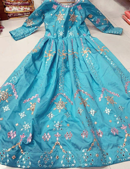 Sky blue heavy taffeta silk thread embroidered mirror work gown