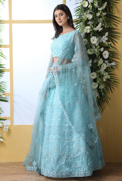 Sky blue net heavy thread embroidered wedding lehenga choli
