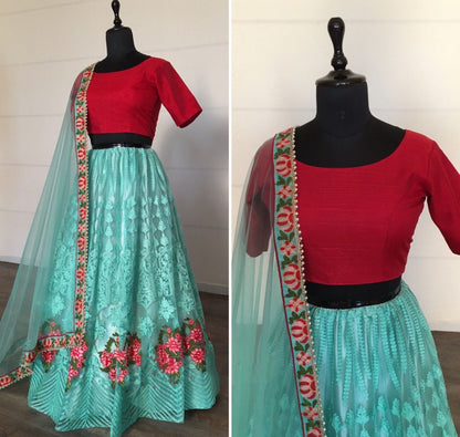 Sky blue net sequence embroidered ceremonial lehenga choli