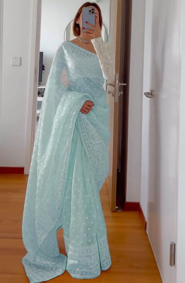Sky blue organza silk heavy thread embroidery work saree for ceremony