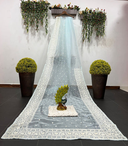 Sky blue organza silk heavy thread embroidery work saree for ceremony