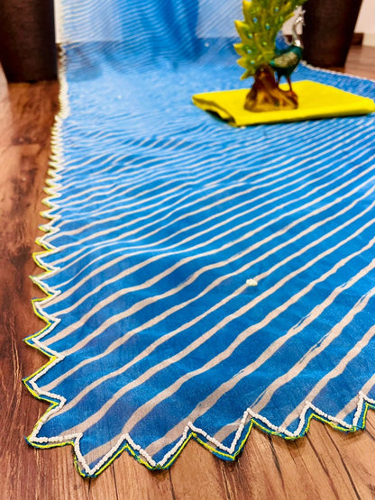 Sky blue organza silk printed and handworked saree