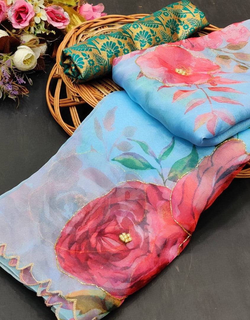 Sky blue soft organza flower printed ceramic stone work saree