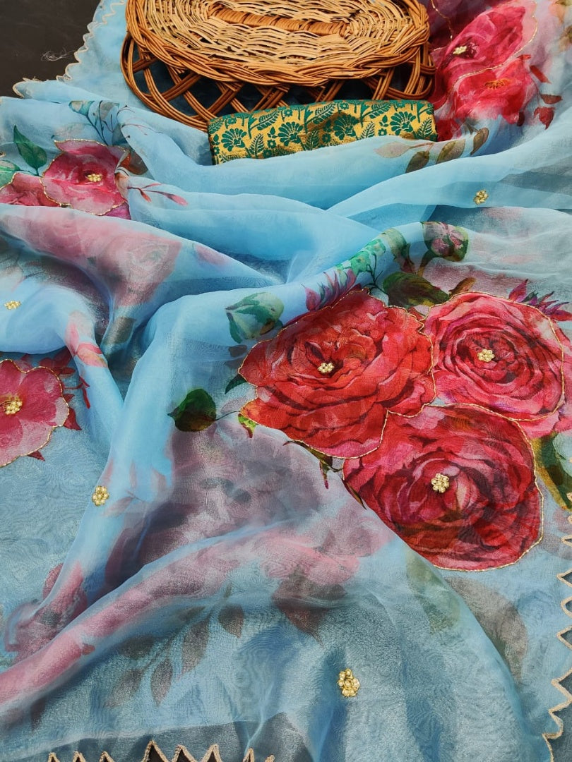 Sky blue soft organza flower printed ceramic stone work saree