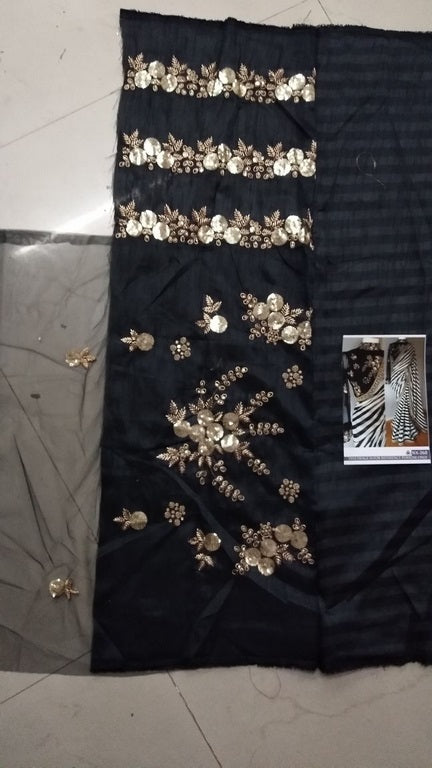 Stylist black and white strip embroidered partywear saree