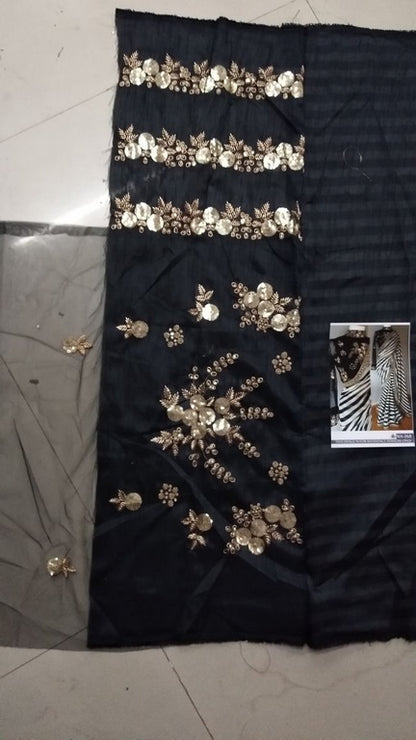 Stylist black and white strip embroidered partywear saree