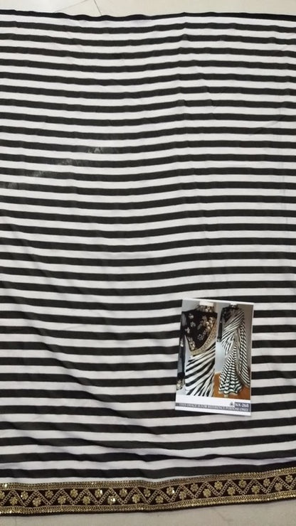 Stylist black and white strip embroidered partywear saree