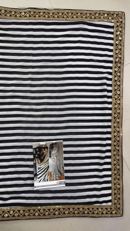 Stylist black and white strip embroidered partywear saree