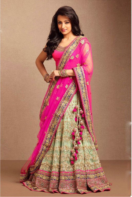 stylist Green pista heavy embroidered Bridal lehenga