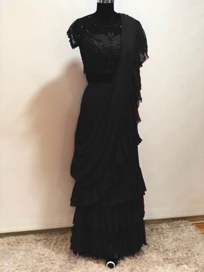Stylist partywear ruffle saree with net embroidered blouse