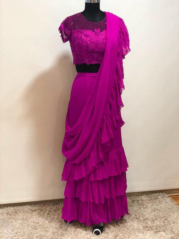 Stylist partywear ruffle saree with net embroidered blouse