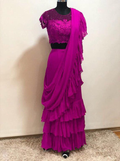 Stylist partywear ruffle saree with net embroidered blouse