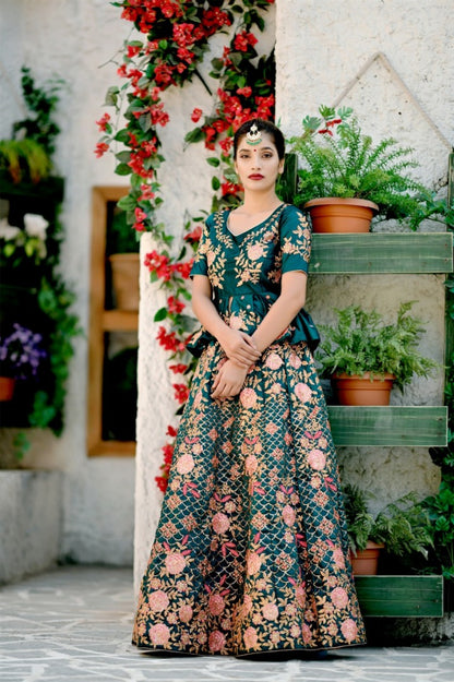 Teal green heavy embroidered wedding lehenga with long stylist choli