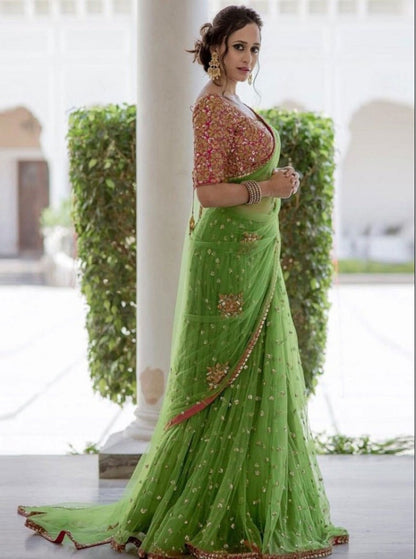 Trendy green embroidered mono net wedding saree