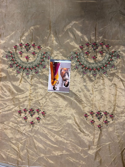 wedding wear yellow and pink half half embroidered saree