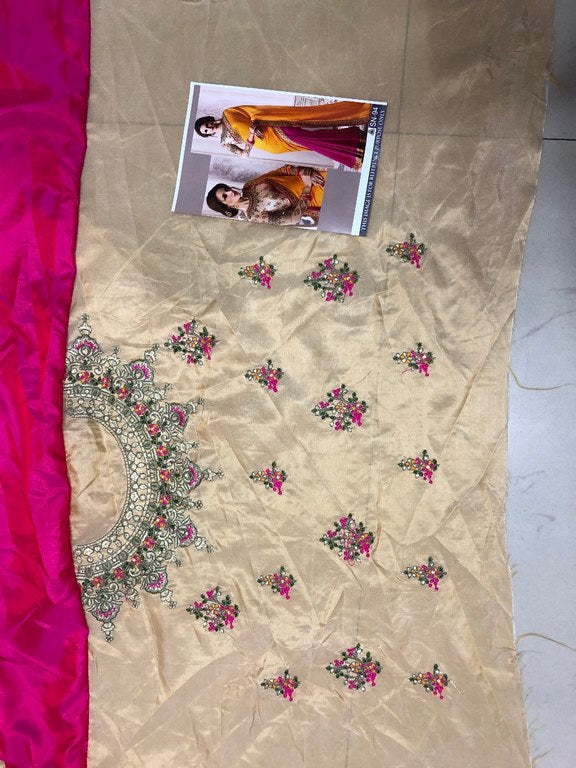 wedding wear yellow and pink half half embroidered saree