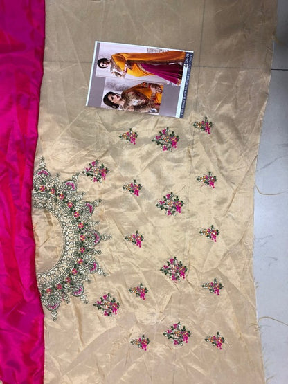 wedding wear yellow and pink half half embroidered saree