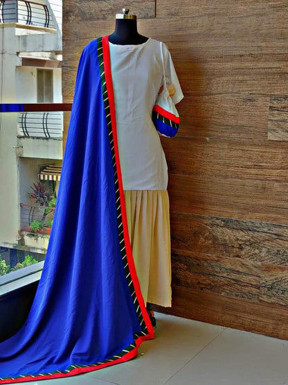 White and beige kurti with blue dupatta