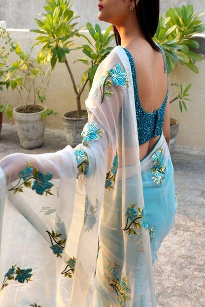 White and blue half half embroidered saree