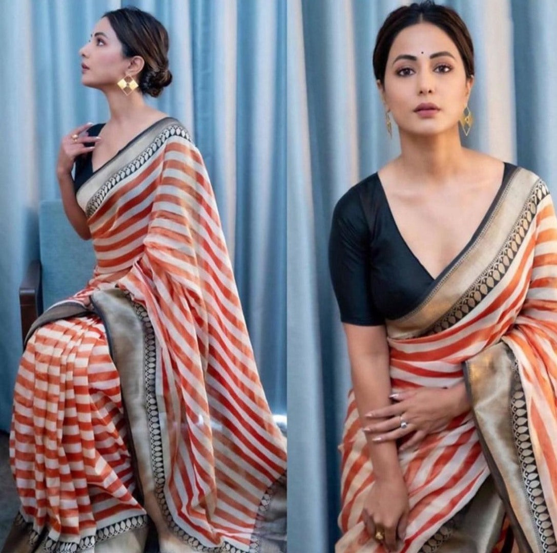 White and orange strip printed saree