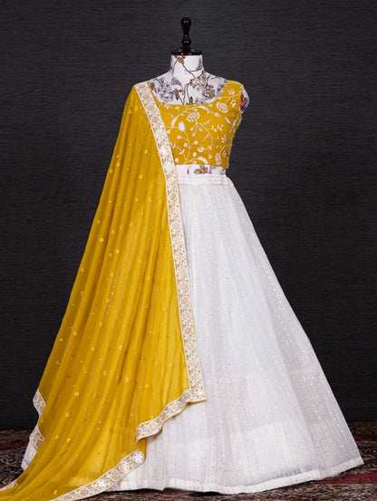 White and yellow georgette heavy sequence thread work lehenga choli