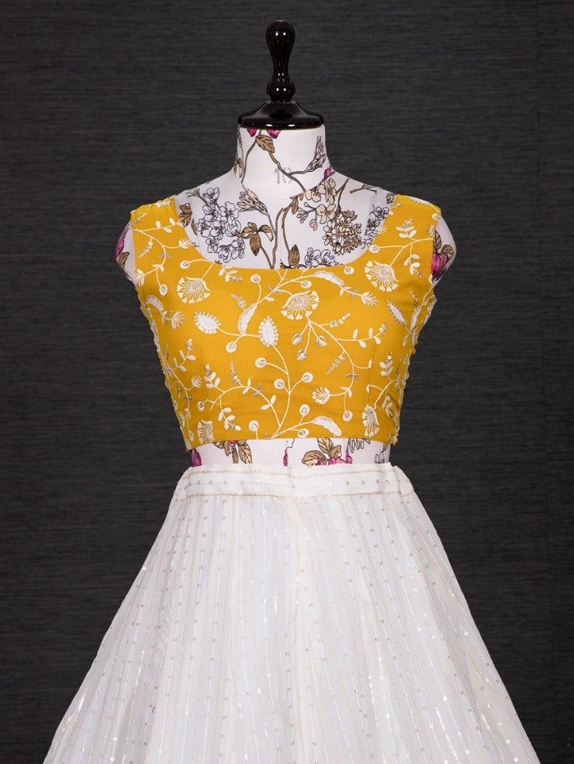 White and yellow georgette heavy sequence thread work lehenga choli