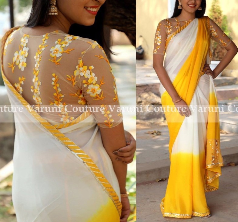 white and yellow georgette saree with embroidered blouse