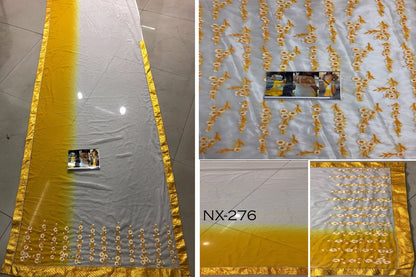 white and yellow georgette saree with embroidered blouse