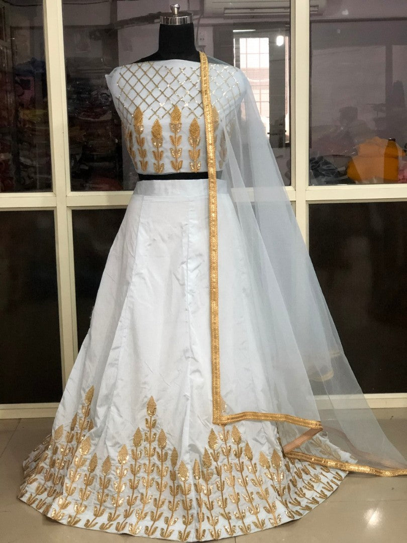 White banarasi silk embroidered ceremonial lehenga choli