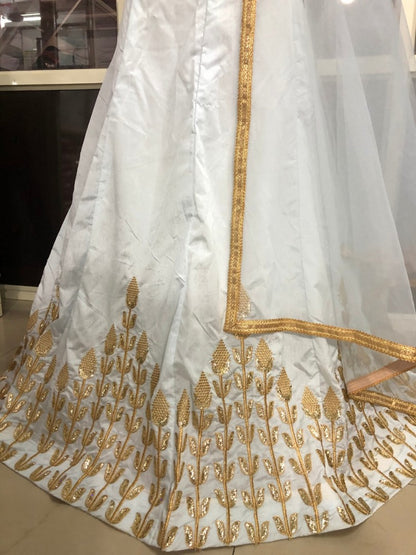 White banarasi silk embroidered ceremonial lehenga choli