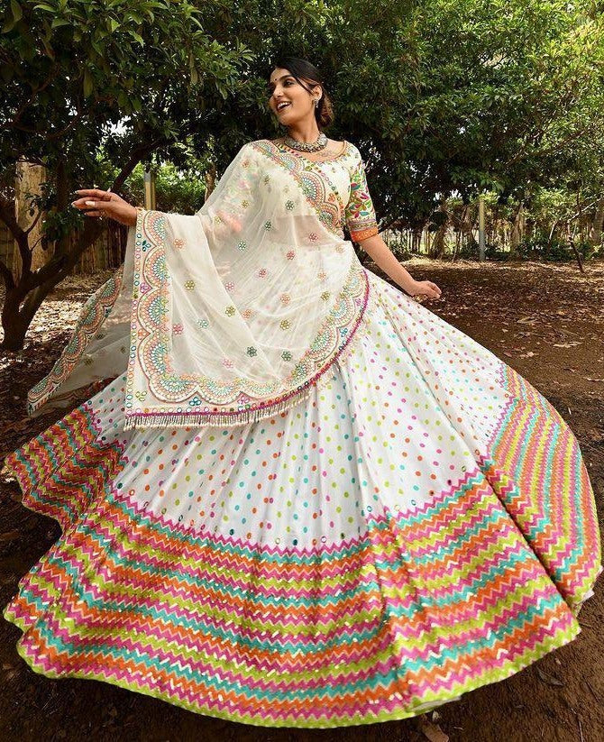 White butter silk print and mirror work navratri festival lehenga choli