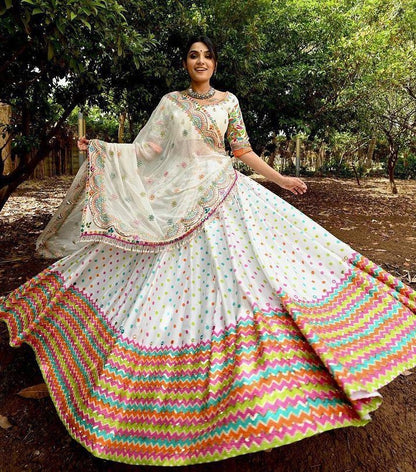 White butter silk print and mirror work navratri festival lehenga choli
