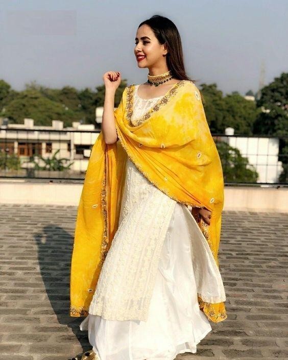 White georgette embroidered plazzo suit with yellow dupatta