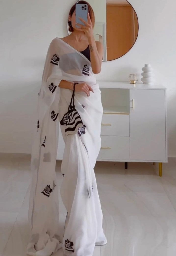 White georgette embroidery work saree