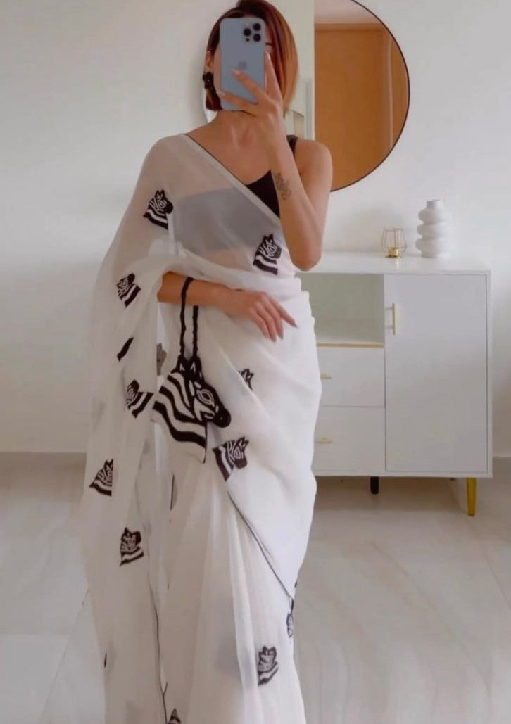 White georgette embroidery work saree