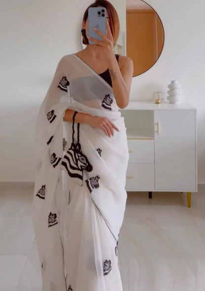 White georgette embroidery work saree