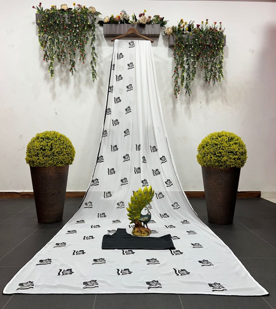 White georgette embroidery work saree