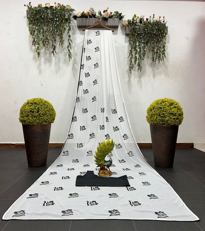 White georgette embroidery work saree