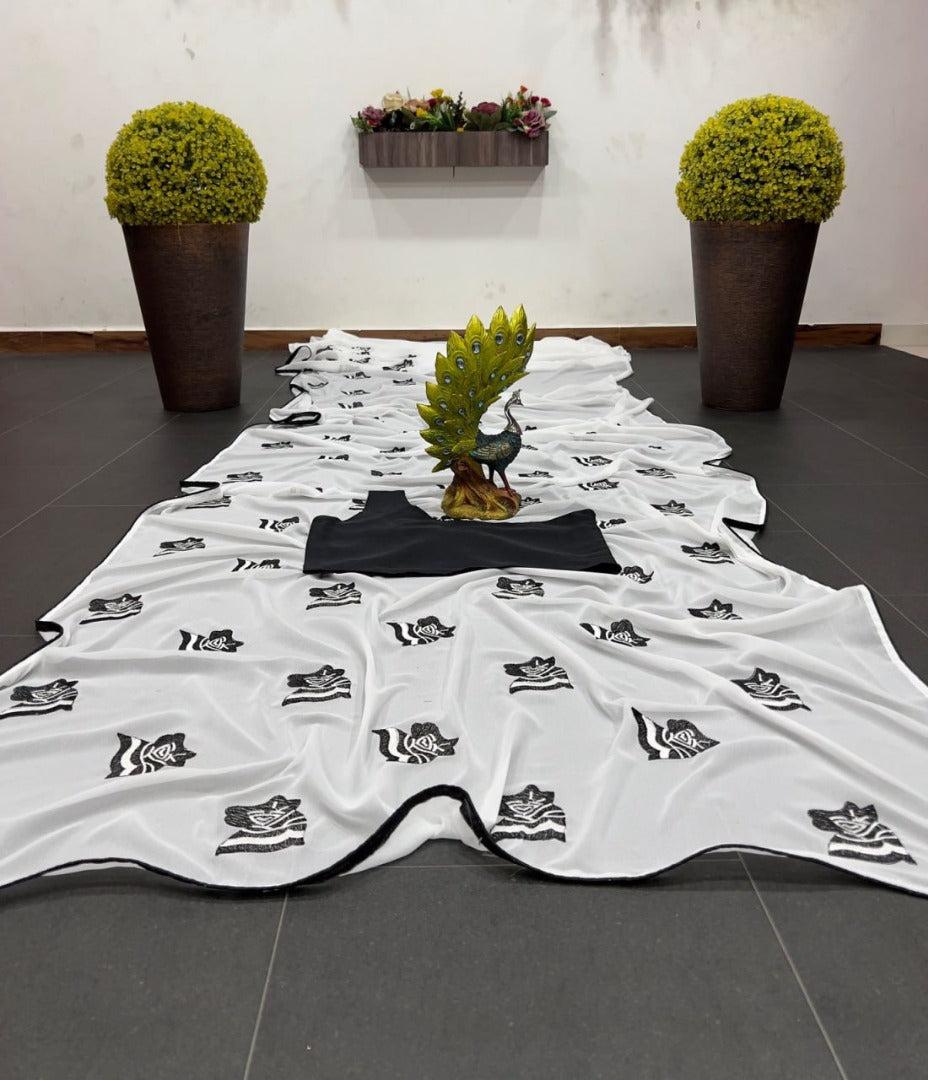White georgette embroidery work saree