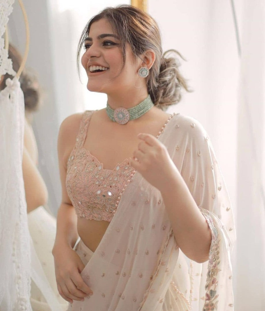 White georgette fancy thread and miror work ruffle saree